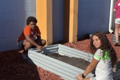 010_Working-to-fill-beds-with-topsoil